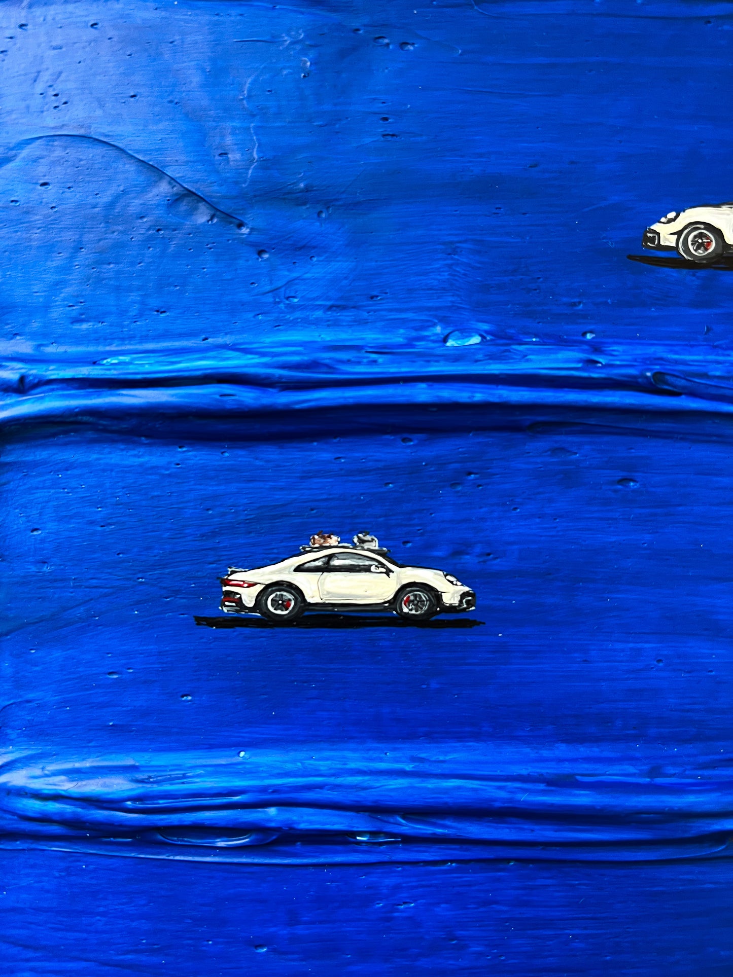 Porsche & blue field